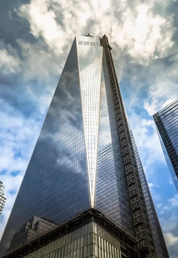 Skyscraper rising into a bright sky